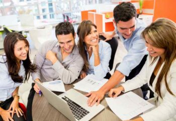 Business team at the office working on a laptop