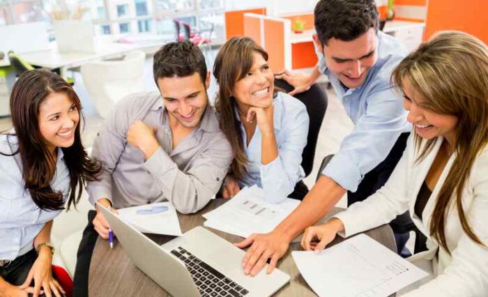 Business team at the office working on a laptop